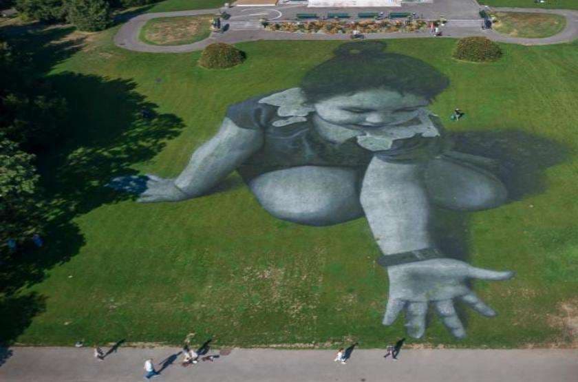 giant landart painting near lake in geneva catching eyes of onlookers