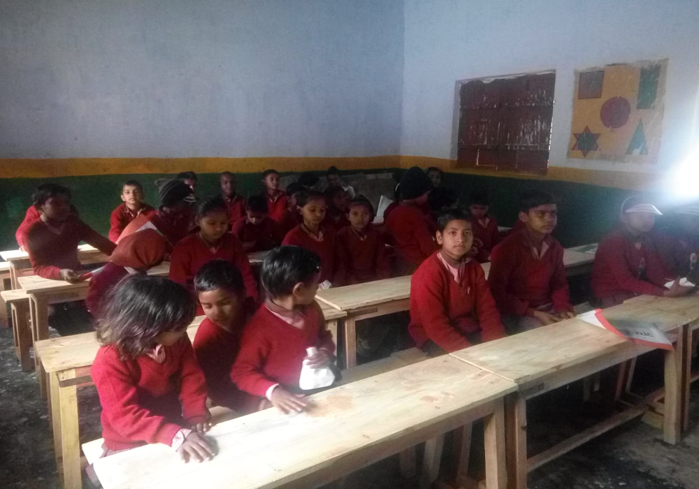 Seat Bench distribution in Primary School Munimabad Barabanki