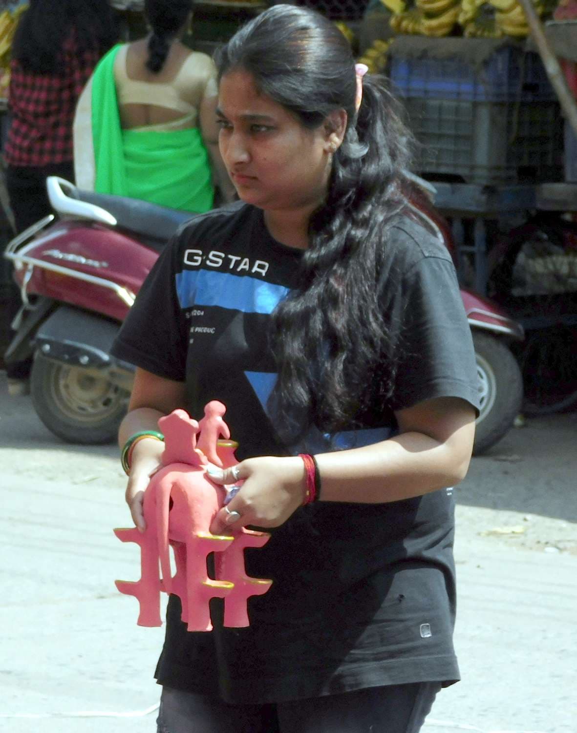 Women shopping for elephants in markets for Mahalaxmi Puja