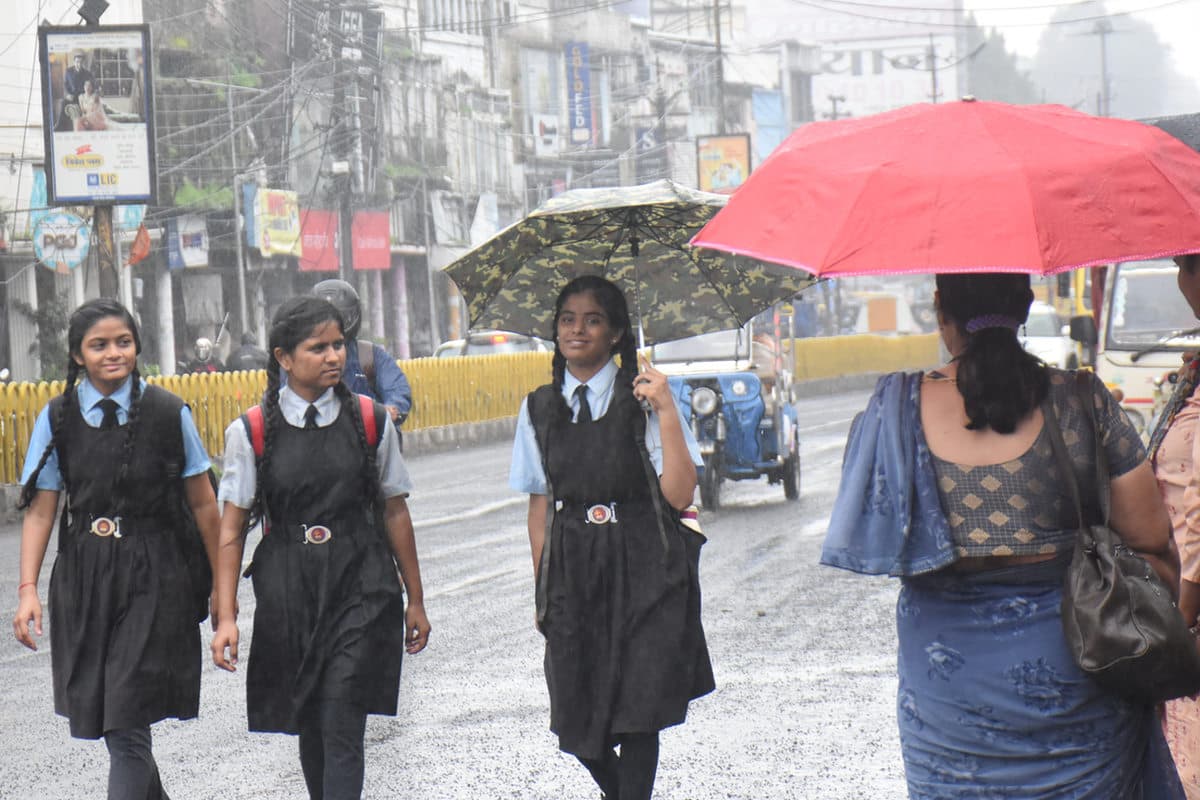 School girls in rain