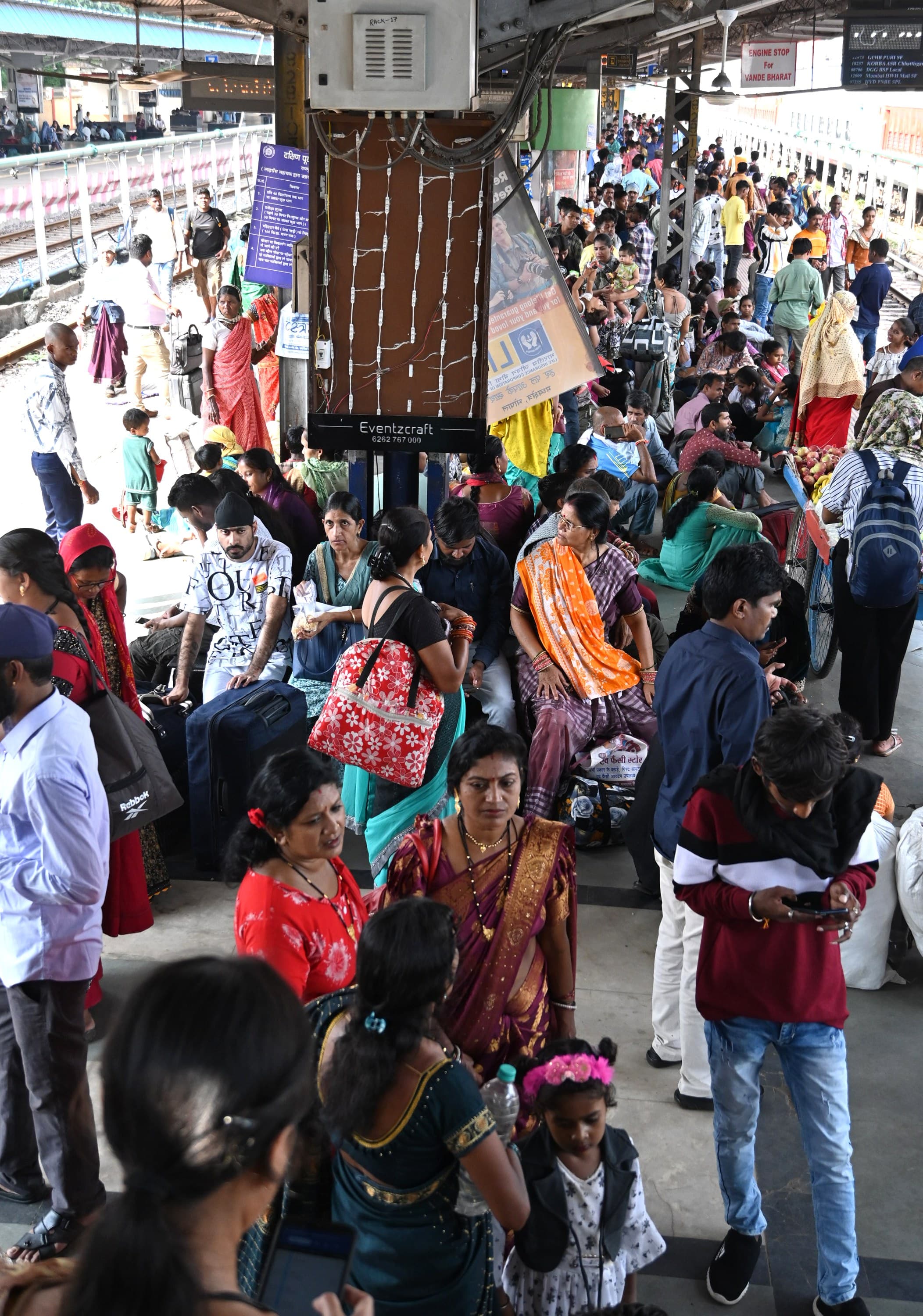 Women were seen waiting for the local train in the station