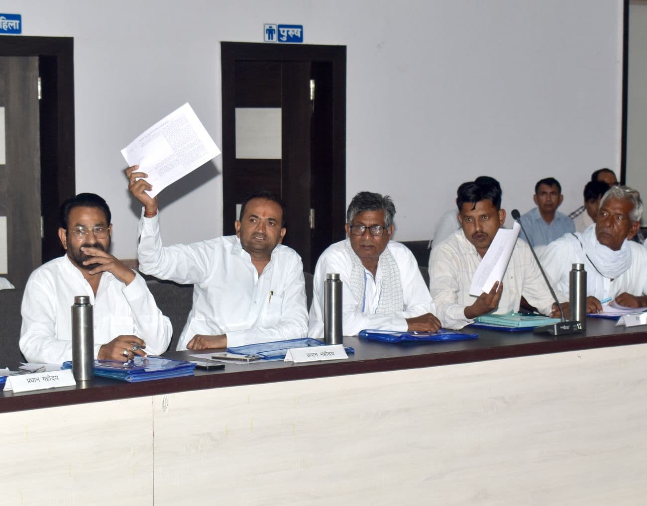 District Council General Assembly meeting: Public representatives, troubled by illegal mining along with water and broken roads, surrounded the officers.